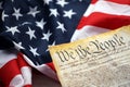 Preamble to the Constitution of the United States and American Flag close up Royalty Free Stock Photo