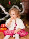 Preaty little girl eating tangerine Royalty Free Stock Photo