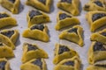 Prebaked `Haman pockets` also known as Hamantashen, an Ashkenazi Jewish triangular filled-pocket cookies