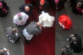 Prebendaries greet Pope Benedict at the entrance to the Zagreb cathedral