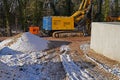 Precast concrete elements and accessories for setting bored piles in snow on a construction site in Halle an der Saale Royalty Free Stock Photo