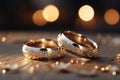 Precious bands Silver and gold wedding rings, bokeh background allure Royalty Free Stock Photo