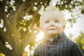 Precious Blonde Baby Boy Outdoors at the Park Royalty Free Stock Photo