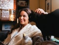 Precious kitty. an attractive young woman relaxing on the sofa at home and bonding with her cat. Royalty Free Stock Photo