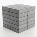 Stack of 16 Gray Concrete Building Blocks Arranged in a Cube Shape on a White Surface Royalty Free Stock Photo