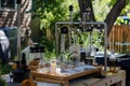 Precise Glassware Apparatus Processes Liquids with Precision Outdoors, Experimenting with Fluid Dynamics in a Tranquil Garden