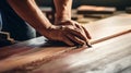 Precision and care in placing laminate floor tiles. Royalty Free Stock Photo