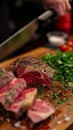 Precision in cooking Chefs hands cutting a large beef portion