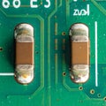 Precision Electronics - SMD Capacitors on PCB Royalty Free Stock Photo