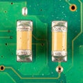 Precision Electronics - SMD Capacitors on a PCB Royalty Free Stock Photo