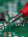 Precision Electronics Testing on a Circuit Board Royalty Free Stock Photo