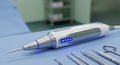 Precision Electrosurgical Pen with Blue Indicator Lights on Sterile Operating Room Drape Royalty Free Stock Photo