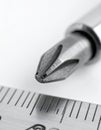 Precision Engineering - Screwdriver Bit and Ruler Royalty Free Stock Photo