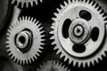 The precision of engineering is showcased through a close-up of complex mechanical gears and chains within a workshop Royalty Free Stock Photo