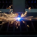 Precision laser cutting in action Royalty Free Stock Photo