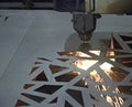 precision laser cutting of steel sheets on a cnc laser machine during parts manufacturing