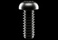 Precision machine screw ready for industrial assembly and engineering design Royalty Free Stock Photo