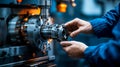 Precision Machining Close-Up of CNC Operator Working on Metal Component in Industrial Setting Royalty Free Stock Photo