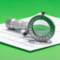 Precision Magnifier on an Engineering Blueprint Royalty Free Stock Photo