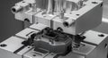 Precision Metal Mold Component Assembly Black and Silver Hues Manufacturing Device for Engineering Solutions Mechanical Royalty Free Stock Photo