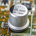 Precision 25 MHz Crystal Oscillator on a Circuit Board Royalty Free Stock Photo