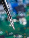 Precision Soldering on an Electronic Circuit Board Royalty Free Stock Photo