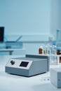 Precision spectrometer on a pristine white lab bench in a controlled setting Royalty Free Stock Photo