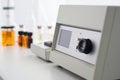 A precision spectrometer rests on a pristine white lab bench in a controlled setting. Royalty Free Stock Photo