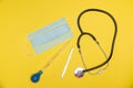 Precission sharp knife with sterile mouth face mask, stethoscope and pipette