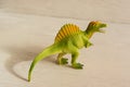 Predatory spinosaurus with open mouth, plastic dinosaur figures of extinct ancient creatures and favorite toys of kids