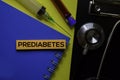 Prediabetes text on Sticky Notes. Top view isolated on yellow background. Healthcare/Medical concept