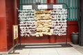 Predicted paper for answer fortune and tied and drop at Marishiten Tokudaiji Temple in Ameyoko Market at Ueno city in Tokyo, Japan