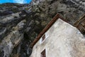 Magnificent stone castle built in front of the cave entrance, shielded by rocks from above at Predjama, Slovenia