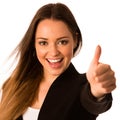 Preety asian caucasian business woman gesturing success showing thumb up Royalty Free Stock Photo