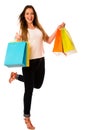 Preety young woman with colorful shopping bags isolated over white background Royalty Free Stock Photo