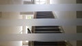 Prefabricated house building interior with entrance hall and staircase. Precast concrete staircase. Staircases adorn the building Royalty Free Stock Photo