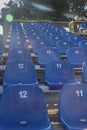 Prefabricated stand with blue plastic chairs Royalty Free Stock Photo