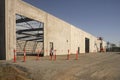 A prefabricated tilt-up warehouse under construction.