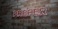 PREFER - Glowing Neon Sign on stonework wall - 3D rendered royalty free stock illustration