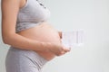 Pregnancy care. cardiotocography fetal heartbeat examination. pregnant woman holds in her hands the results Cardiotocography of Royalty Free Stock Photo