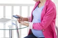 Pregnancy diabetes- Pregnant woman taking a blood sample glucose level Royalty Free Stock Photo