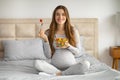 Pregnancy Diet. Beautiful Young Pregnant Woman Holding Bowl With Fresh Vegetable Salad Royalty Free Stock Photo