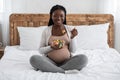 Pregnancy Diet And Nutrition. Pregnant African American Woman Eating Fresh Vegetable Salad Royalty Free Stock Photo