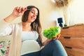 Pregnancy eating healthy salad. Happy pregnant woman eating nutrition food. People lifestyle food concept. Royalty Free Stock Photo