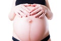 Pregnancy line - linea nigra, pregnant woman belly on white background