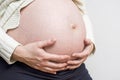 Pregnancy, motherhood, people and expectation concept - close up of happy pregnant woman with big belly Royalty Free Stock Photo