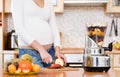 Pregnancy and nutrition - pregnant woman with fruits