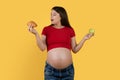 Pregnancy Nutrition. Pregnant Young Woman Choosing Croissant Instead Of Green Apple