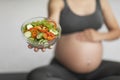 Pregnancy Nutrition. Unrecognizable Pregnant Woman Holding Bowl With Fresh Vegetable Salad Royalty Free Stock Photo