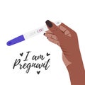 Pregnancy ovulation test in african woman hand